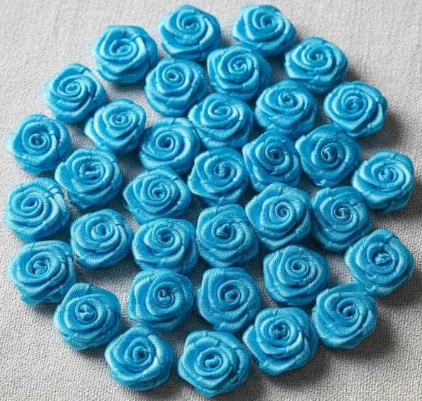 FLOR ROCOCO MINI SIN CABO -PAQ X 144 UNIDADES 